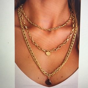 Gold triple chain necklace
